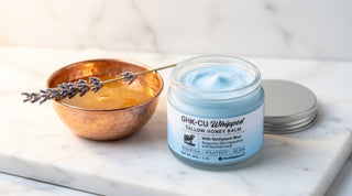 HealthyDerm Blue Balm jar with copper peptide and methylene blue on marble surface with honey